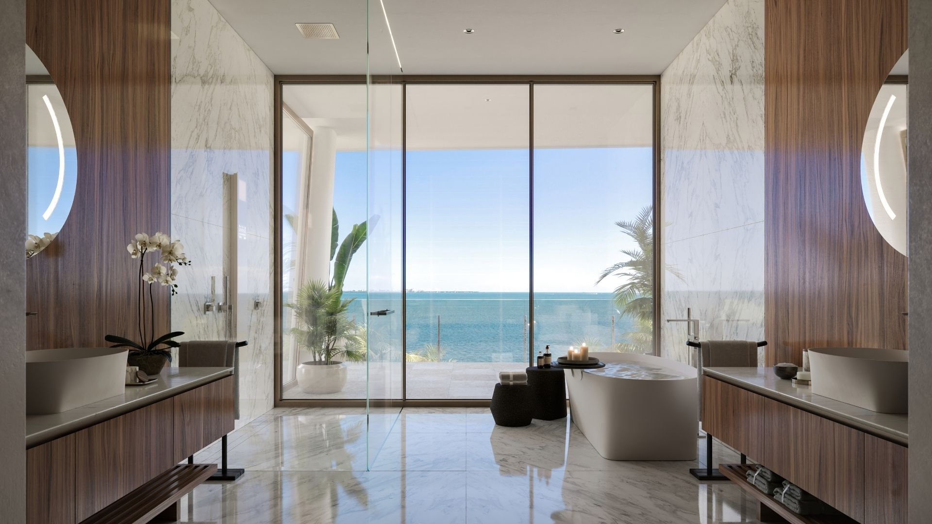 Modern bathroom with large windows offering ocean view